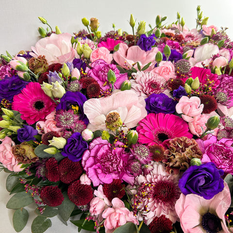 Lukket hjerte med eksklusive blomster